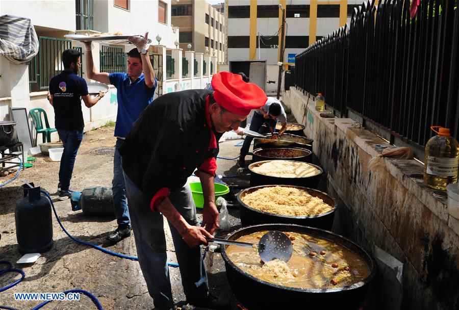 SYRIA-DAMASCUS-RAMADAN-CHARITY-MEALS