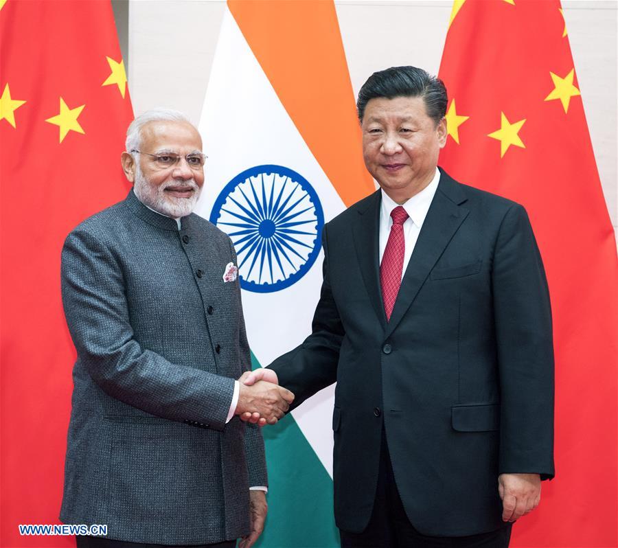 (SCO SUMMIT) CHINA-QINGDAO-XI JINPING-INDIA-NARENDRA MODI-MEETING (CN)