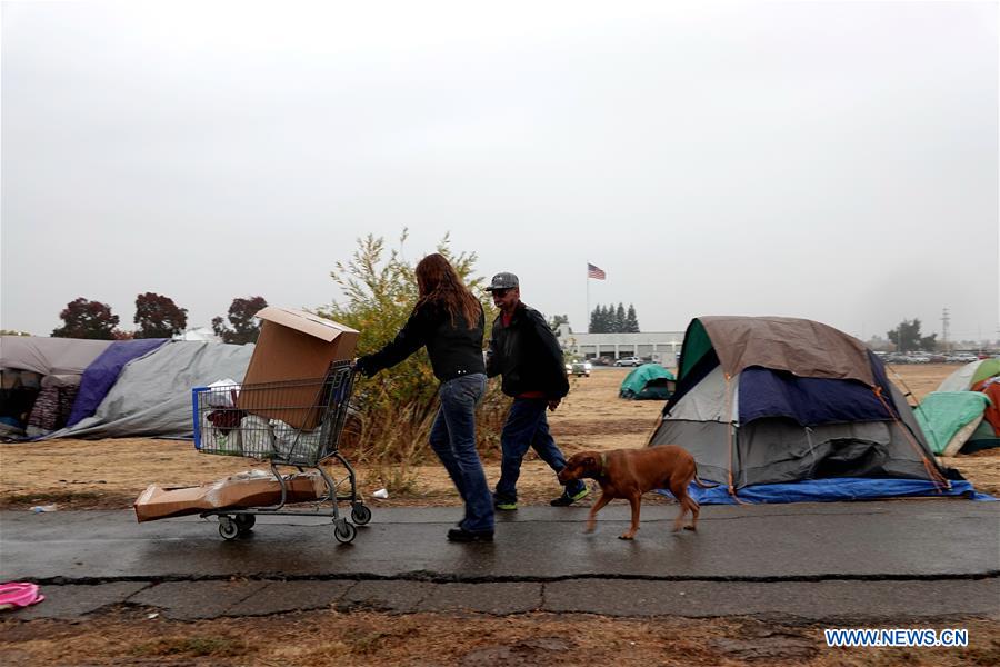 U.S.-CALIFORNIA-BUTTE-WILDFIRE-RAIN